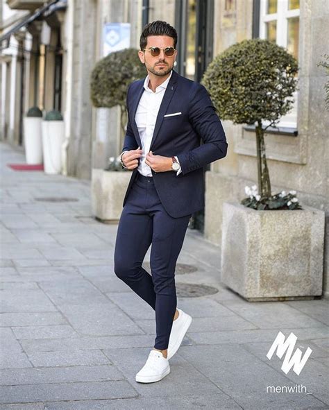 casual suit with white sneakers.